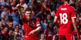 Will coup Tottenhams Andy Robertson skriver på